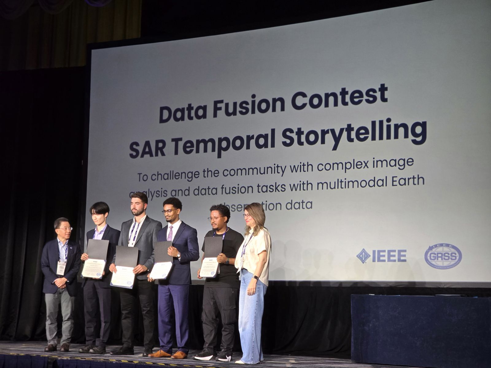 Data Fusion Contest winning team on stage at IGARSS 2026